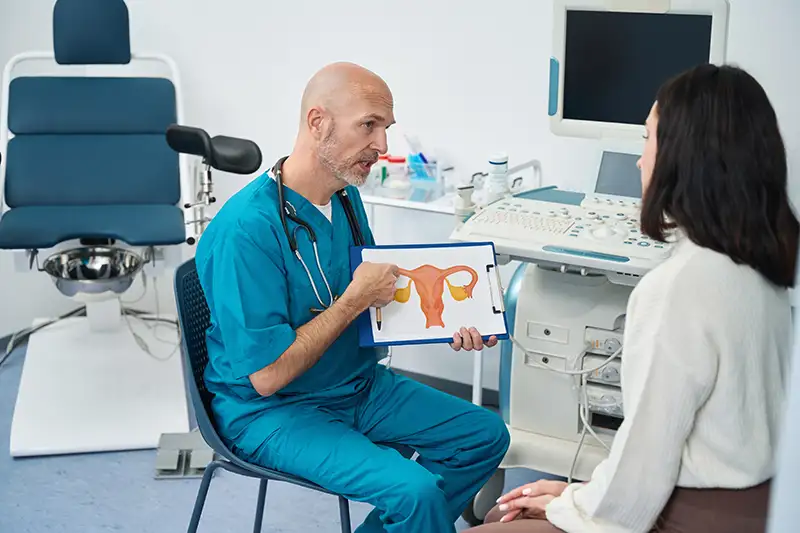 A woman at a doctor's office learning about urinary incontinence