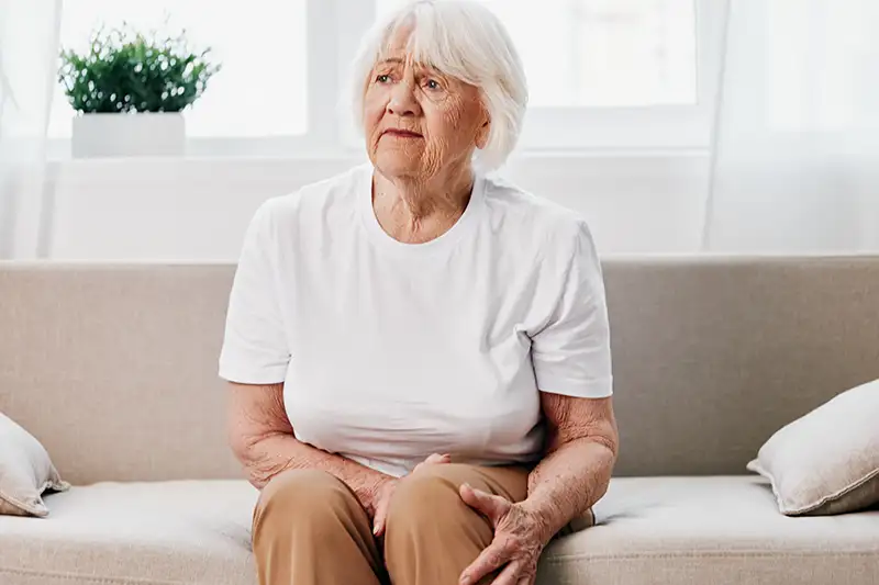 An older woman sitting