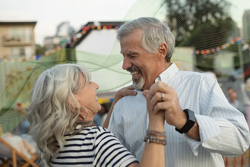 Couple dancing and with no bladder issues thanks to Axonics Therapy.