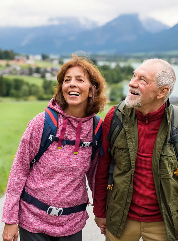 Older couple hiking not worrying about bladder issues anymore